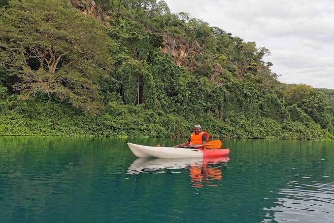 Canoeing and rim time at Lake Chala · Lake Chala